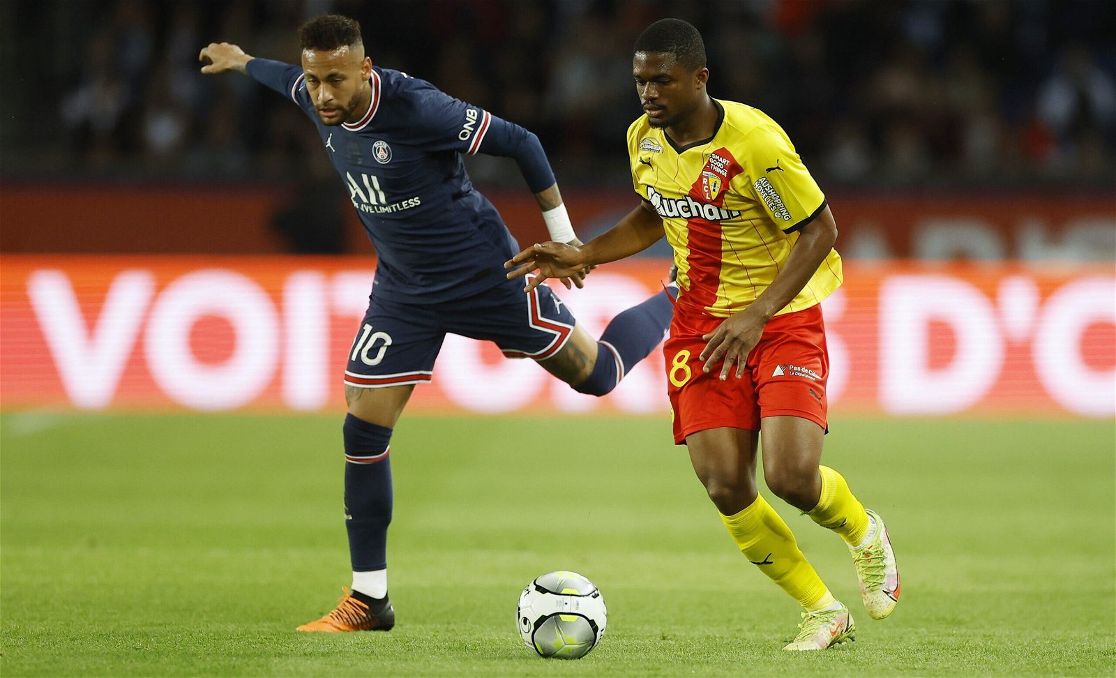 RC-Lens-midfielder-Cheick-Doucoure-in-Ligue-1-action-against-Paris-Saint-Germain